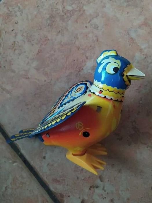 Brinquedo Pássaro em lata